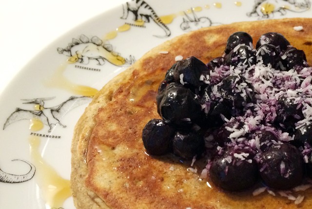 banana and coconut pancakes with blueberries