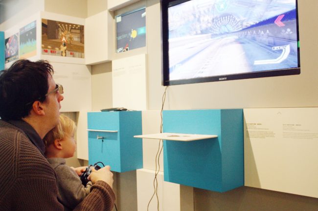 Computer Games Museum Berlin - Father and Son Playing