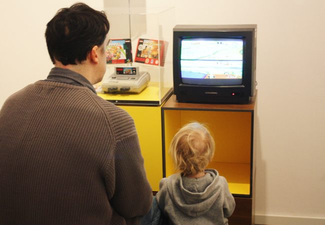 Computer Games Museum Berlin - Father and Son Playing