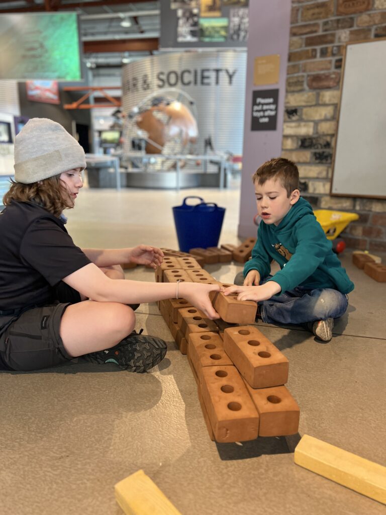 Summerlee Museum playing with bricks
