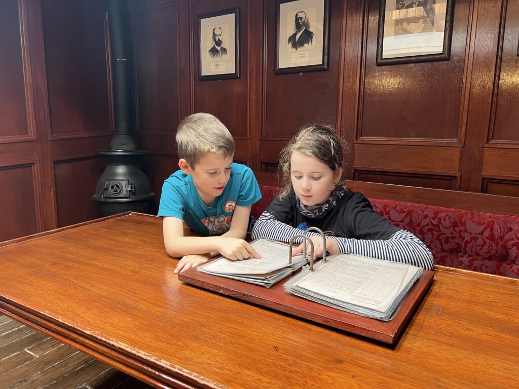 Tall Ship Glenlee browsing the log book